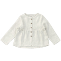 Weiße Babybluse aus Leinen mit langen Ärmeln und Holzknöpfen, ideal für stilvolle und bequeme Kindermode.