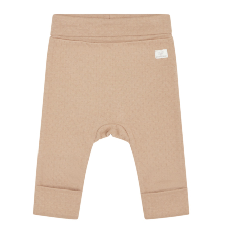 Beige Babyhose aus Baumwolle mit umklappbaren Bündchen, ideal für komfortable und stylische Babyoutfits.